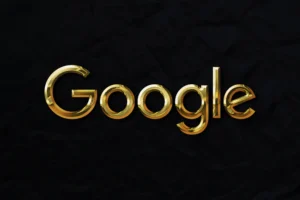 a gold google logo on a black background
