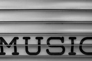 a close up of the word music written in black and white